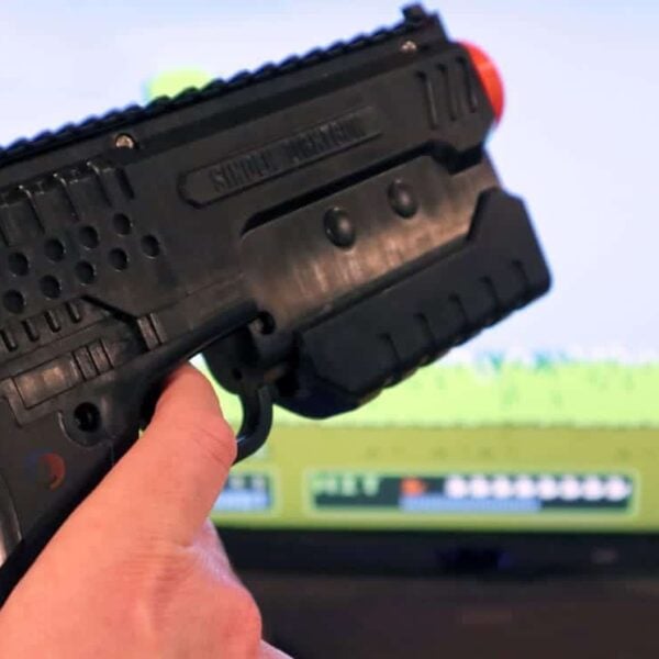 Sinden Light Gun used for immersive arcade shooting games at Electro Arcade.