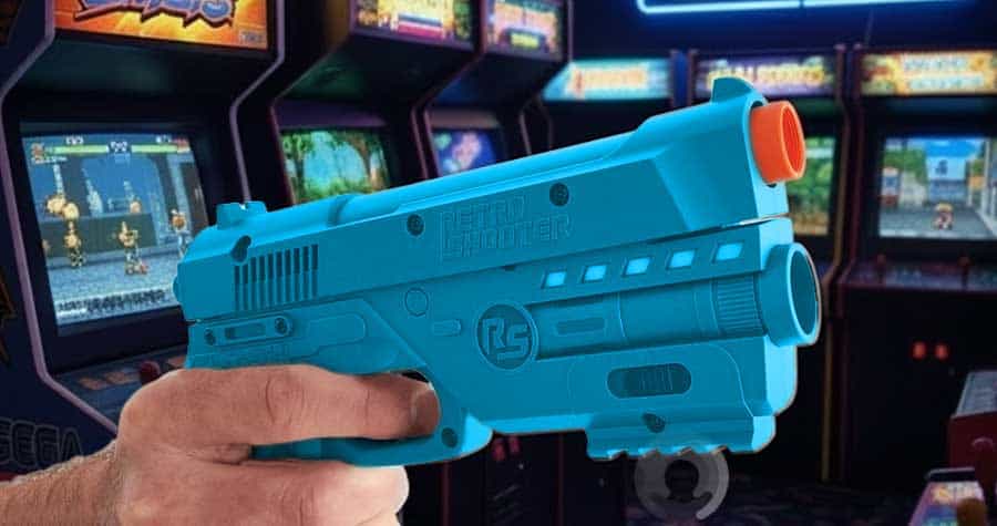 RS3 Reaper Light Gun Kit 8 RS3 Reaper light gun in hand in front of classic arcade machines